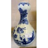 A Chinese blue and white vase, of gourd shaped form painted in blue and white