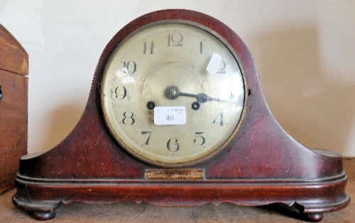 A mahogany cased Napoleon hat mantel clock