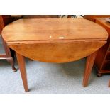 A drop-leaf dining table