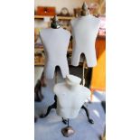 A pair of mannequins on tripod supports, together with a rubberized torso (3)