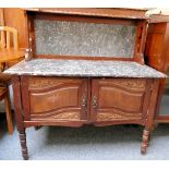 A late Victorian walnut marble top and back washstand 107cm wide