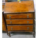 A quartered walnut bureau