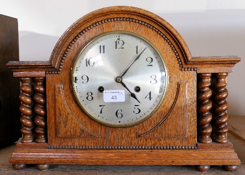 An oak mantel clock