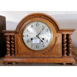 An oak mantel clock