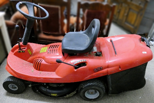 A Champion 6/63 ride-on mower with grass box, bought as seen