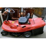 A Champion 6/63 ride-on mower with grass box, bought as seen