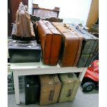 A selection of trunks, leather suitcases, Gladstone bag etc (12)