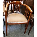 An Edwardian inlaid tub style salon armchair