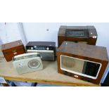 Two early radios, two Bush radios and a wooden cased volt meter