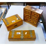 A miniature chest, together with metal bound wooden box and a similar box with contents of