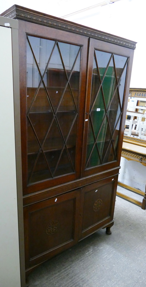 A glazed cabinet/bookcase
