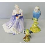 Royal Doulton; a large figurine, Happy Anniversary HN3097 and two Beswick birds, Budgie 1217 and