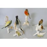 Karl Ens Volkstedt; four bird figurines, to include a Robin and a blue Tit (4).