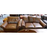 A brown leather two seater sofa, together with a matching chair (2)