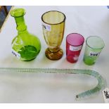 A Victorian green glass decanter of bulbous form, an amber glass pedestal vase and two tumblers in