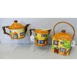 Beswick; a three piece country cottage tea service, comprising tea pot 240, milk jug 242 and biscuit