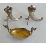 A Norwegian silver salt and pepper pot by Theodor Olsens Eftf, Bergen, in the form of horns and a