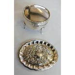 An Edwardian silver dressing table ring box, Birmingham 1906, of drum shaped form with slightly
