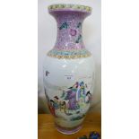 A Chinese vase of baluster form, enamelled with a continuous scene of immortals in attendance in a