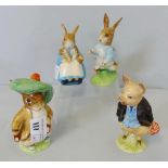 Beatrix Potter; four Beswick figurines, Peter Rabbit, Piggling Bland, Benjamin Bunny and Mrs