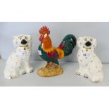 Beswick; a figure of a Leghorn cockerel, 1892 and a pair of white Staffordshire flatback dogs,