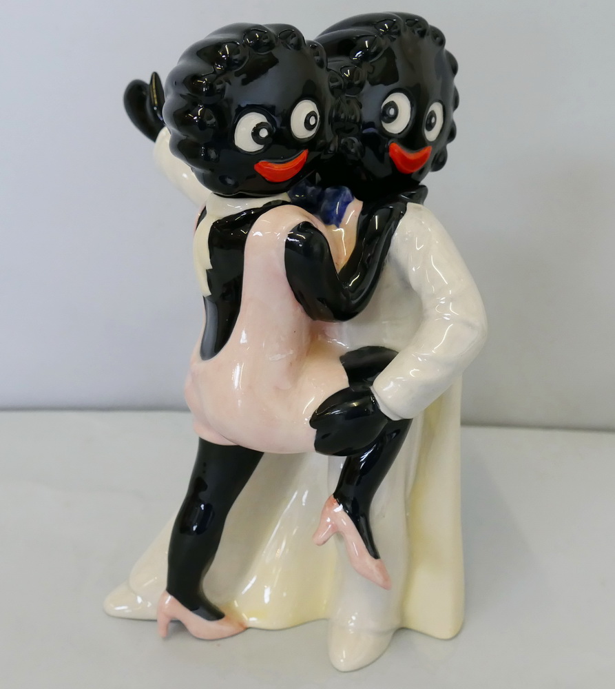 A Carlton Ware limited edition Golly tea pot, in the form of a dancing couple, 7/50, height 22.5cm.