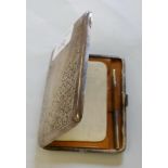 A silver card case either London 1896 or Birmingham 1902, marks poorly struck, with all over