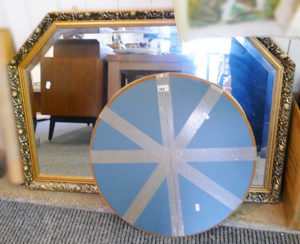 A gilt framed bevel edged over-mantel mirror, together with a circular mirror