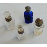 A Victorian silver mounted and blue glass scent bottle, unmarked and three other silver mounted