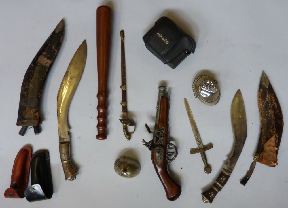 A box of miscellaneous, including camera, lighter, truncheon, kukri, dagger and reproduction