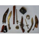 A box of miscellaneous, including camera, lighter, truncheon, kukri, dagger and reproduction