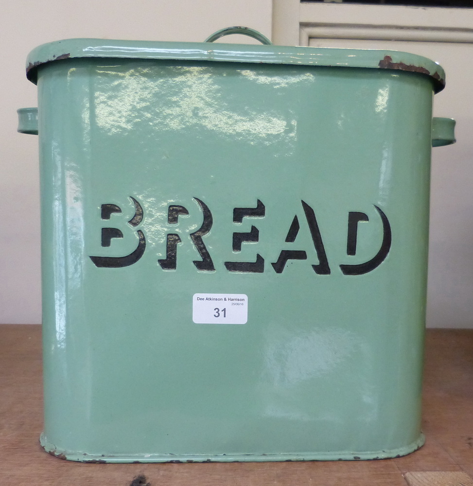 A green enamelled bread bin