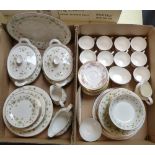 A Royal Doulton dinner service in 'Strawberry Cream' pattern and a Royal Doulton tea service