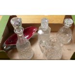 Three decanters, glass jug and Poole style gravy boat
