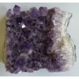 A large slice of mineral jam crystal, possibly amethyst