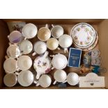 A box of commemorative ware and other tableware, bird figures, brassware etc