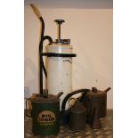 A two stroke oil and petrol mixer, and five various oil/paraffin cans (6).