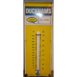 A single sided enamel advertising thermometer/sign, for Duckhams Motor Oil, 91 x 33 cm.