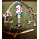 An Esso manual oil pump and three pump handles (4).