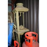 A cast iron petrol pump of unknown make.