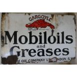 A enamel advertising sign; Gargoyle Mobil oil and greases, 77 x 114 cm.