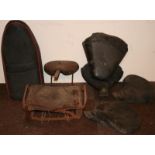 A pre 1930's sprung seat, a sprung rear seat and other seats.