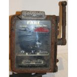 A Metropolitan Taximeter with engine and gearbox drive.