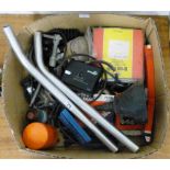 A box of automotive parts, together with a rear luggage blind and 3 rolls of leatherette material