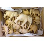 A quantity of small ivory elephants, formally the property of Sir Archibald Rowlands, GCB Finance