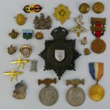 An Essex Constabulary night helmet badge, and various other medallions and badges including Boys