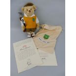 A Steiff Golfer teddy bear, limited edition number 1182/3000, in original bag with certificate, 32cm