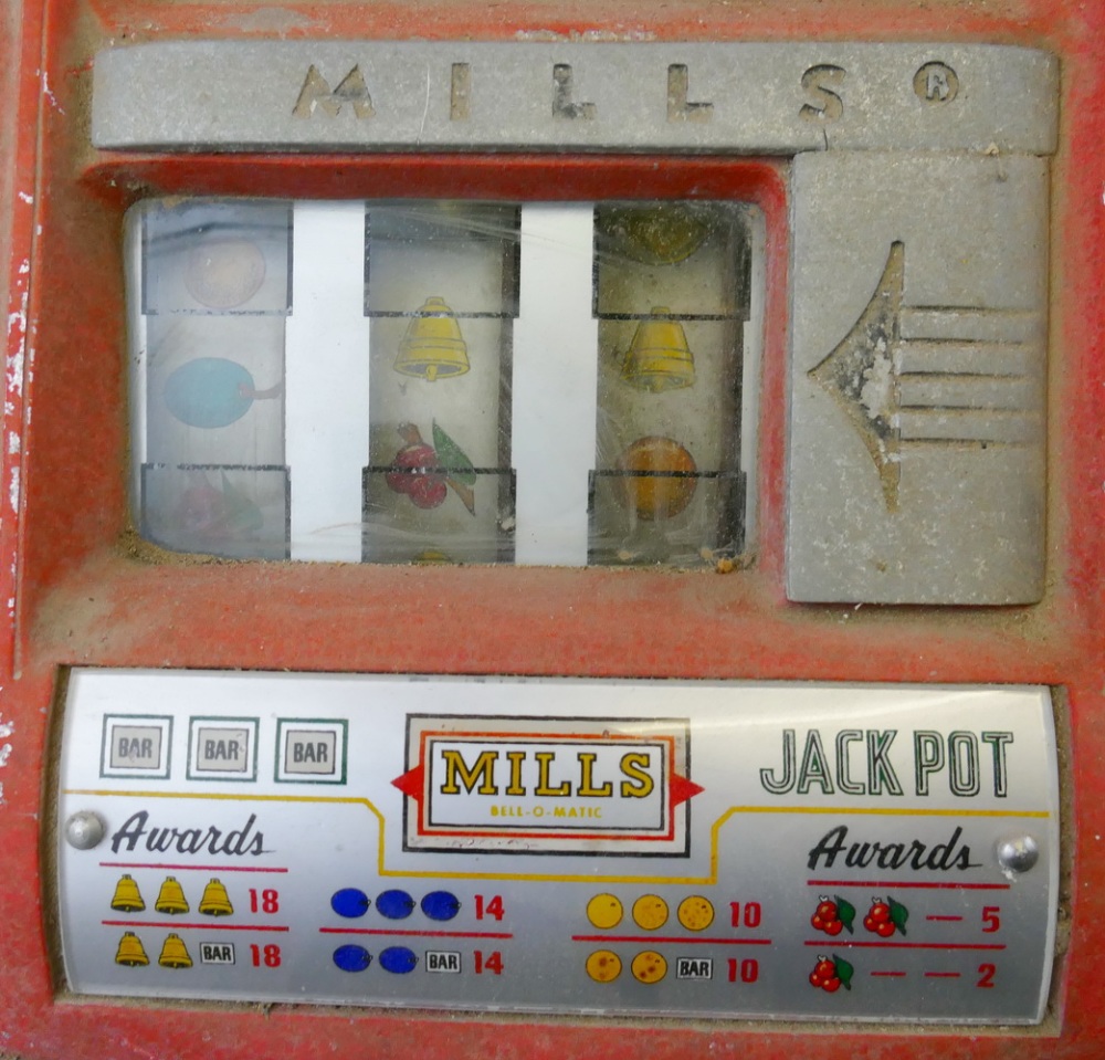 A Mills Bell-o-Matic arcade fruit machine, in aluminium and red painted case with formica type sides - Image 3 of 3