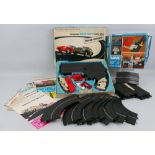 Tri-ang Minic Motor Racing game, two original boxes with track, two cars, paperwork etc