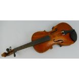 A German half-size violin, with 31.5cm two-piece maple back and pine belly, 52cm overall